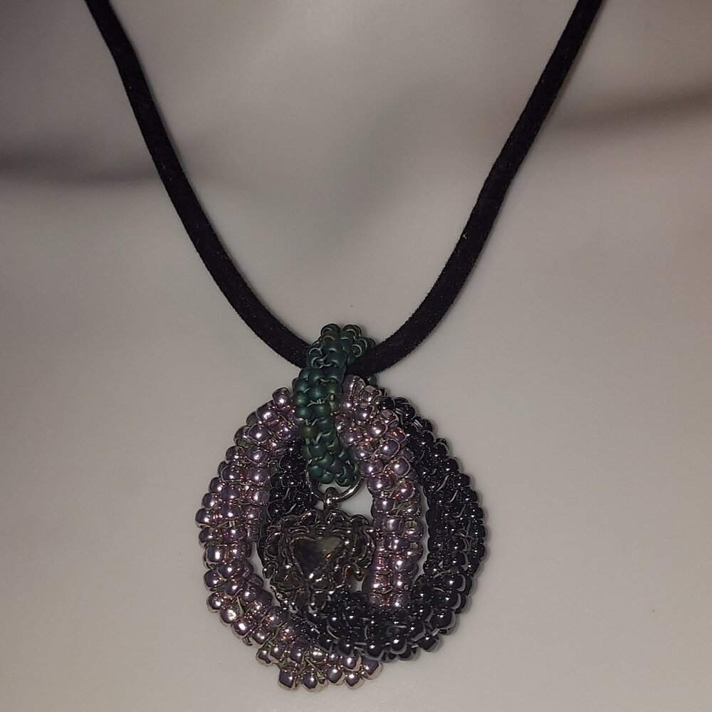 Beaded necklace with heart charm